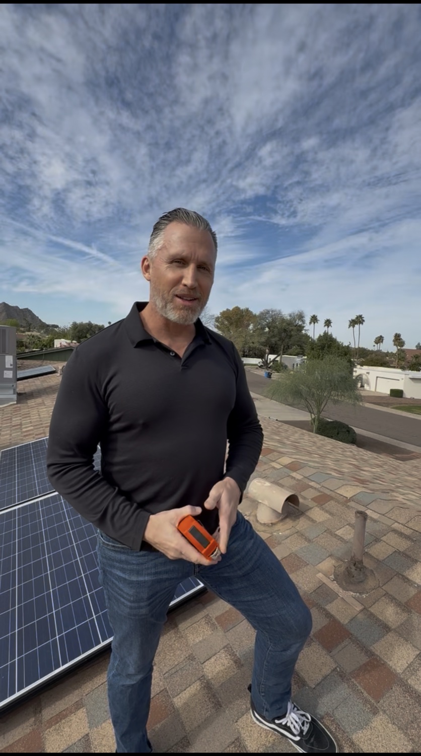 Bryan today — on a rooftop with the Arizona mountains behind him