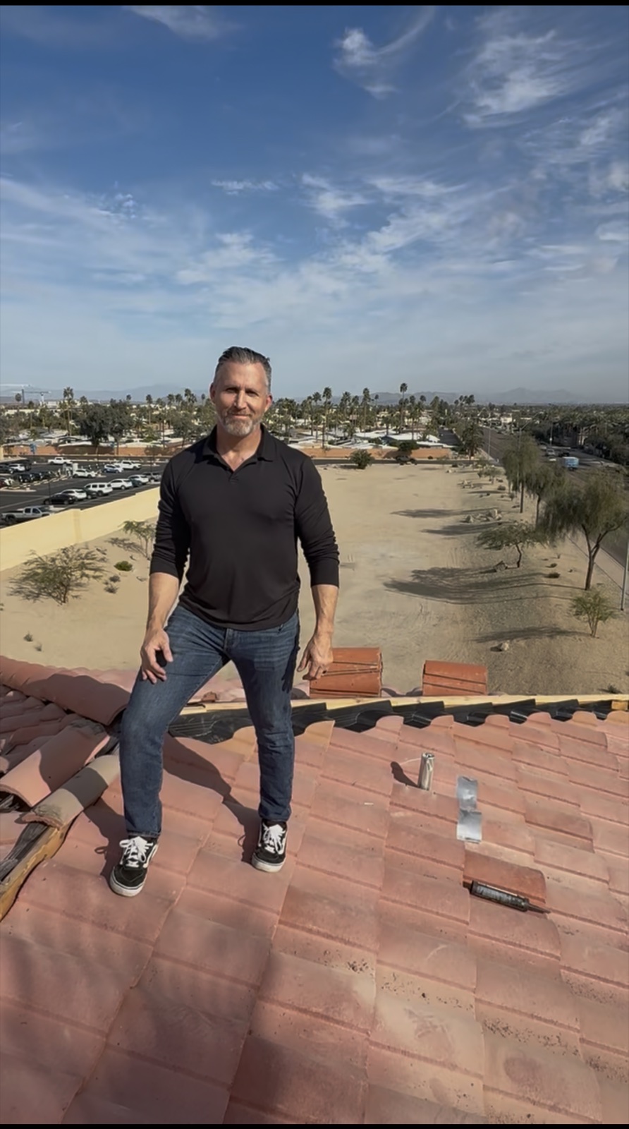 Bryan Stephens on an active tile-roof job site, mid-replacement